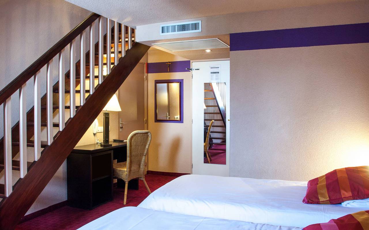 Duplex room with two single beds on the first floor and a staircase, hotels near sanctuary of our lady of lourdes, Hotel Saint-Sauveur. 